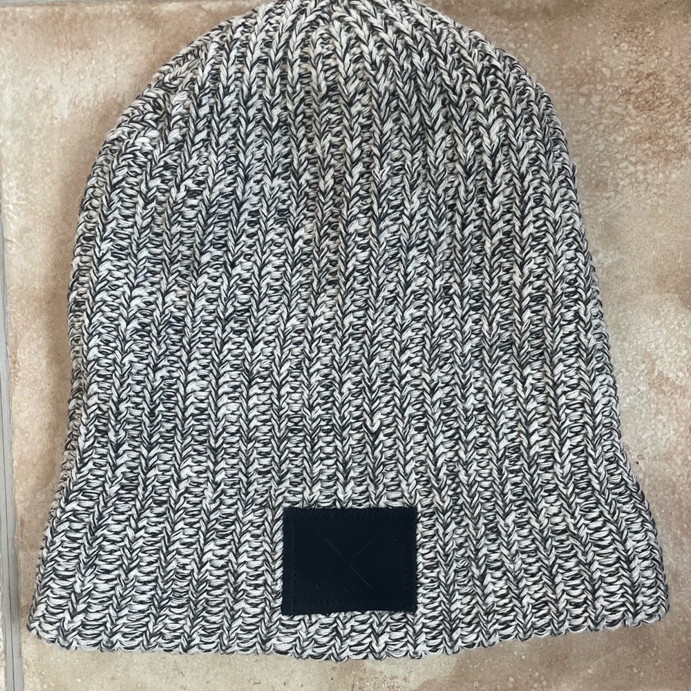 Love Your Melon black and white speckled floppy beanie hat, field hockey logo;OS